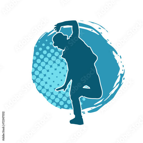 Silhouette of a man in dancing pose. Silhouette of a male dancer in performing pose.