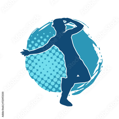 Silhouette of a slim man dancing pose. Silhouette of a male dancer in action pose.