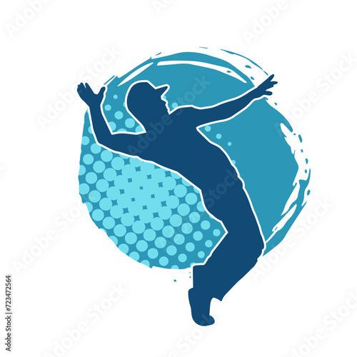 Silhouette of a slim man dancing pose. Silhouette of a male dancer in action pose.