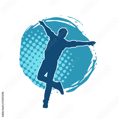 Silhouette of a slim man dancing pose. Silhouette of a male dancer in action pose.