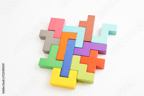 Logical thinking and problem solving problem solution creative business concept, wooden puzzle geometric block shape.