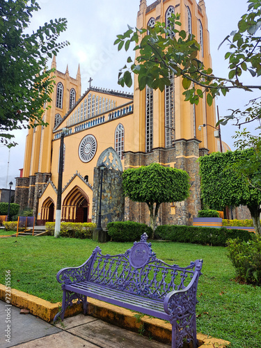 Parish of San Juan Bautista in front of the gardens of the plaza in the center of the magical town Xicotepec Puebla Mexico