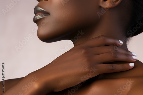 Close-Up of a Graceful Woman Touching Her Neck. Beauty and Skincare Concept photo