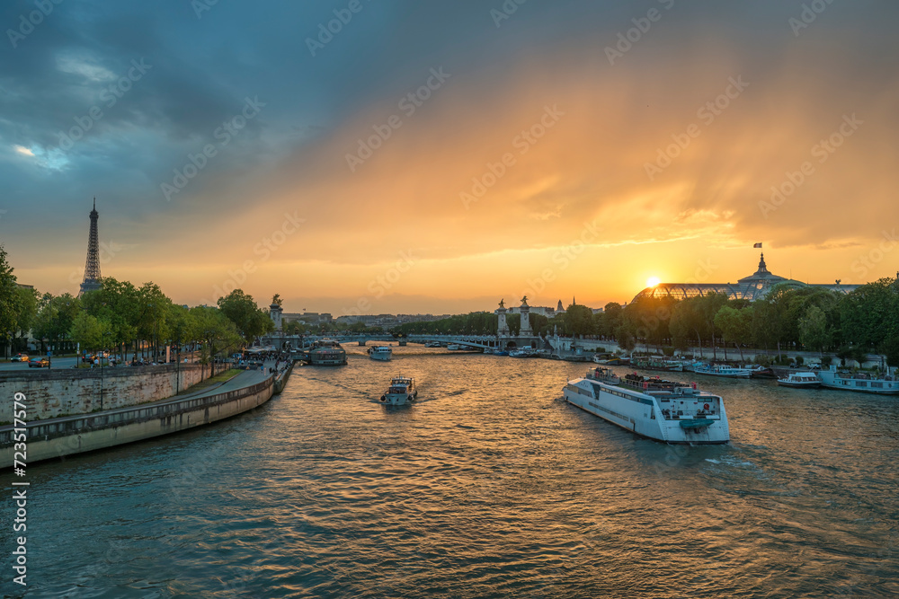 Naklejka premium Paris France, city skyline sunset at Seine River with Pont Alexandre III bridge and Grand Palais