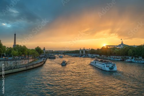 Paris France, city skyline sunset at Seine River with Pont Alexandre III bridge and Grand Palais