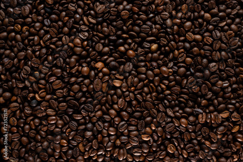 Fototapeta Naklejka Na Ścianę i Meble -  Coffee beans background, a closeup of coffee beans