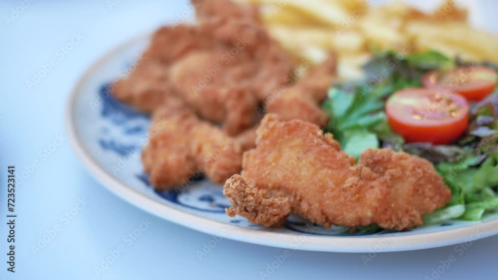 crispy coated fried chicken on a plate crispy coated fried chicken on a plate