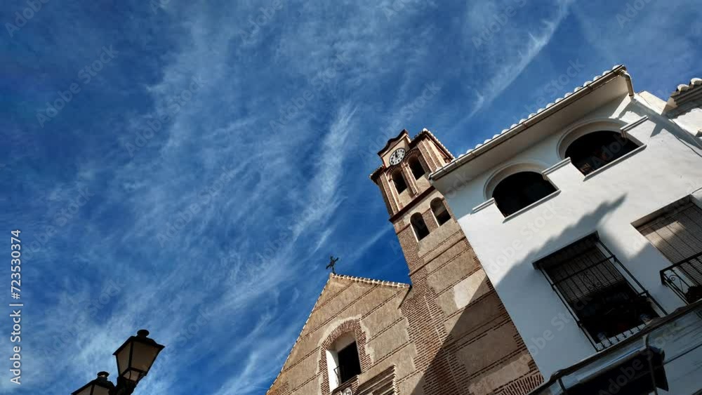 Light clouds passing over Spanish clock tower Time Lapse Light clouds passing over Spanish clock tower Time Lapse