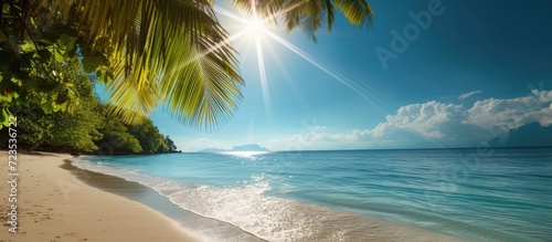 Summer photo of the sun and a beach on an island.