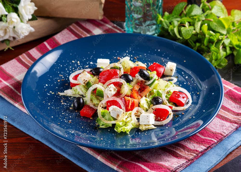 Greek salad from vegetables with cheese on the table, cafe, breakfast