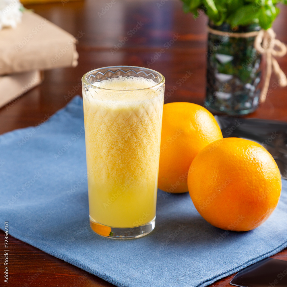 Fresh orange juice on the table, cafe, lunch Fresh orange juice on the table, cafe, lunch