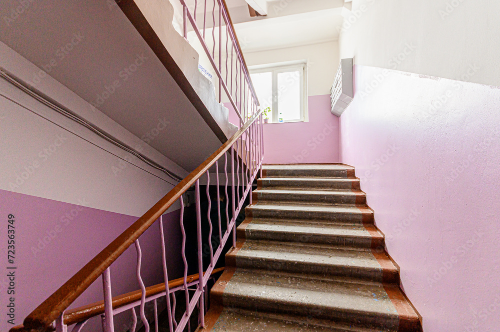 Obraz premium interior public place, house entrance. doors, walls, corridors staircase stairs, steps