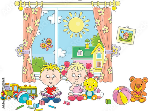 Happy little boy and girl among their funny toys reading an interesting children’s book with pictures in their nursery playroom on a sunny summer day, vector cartoon illustration isolated on white