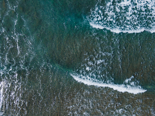 Wallpaper Mural Waves on sea water with deep turquoise water, Aerial top down view Torontodigital.ca
