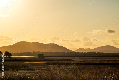 Cungulla wetlands during sunset with mountains in background.