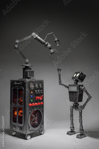 Humanoid robot on a dark background. Concept of the future of artificial intelligence and the fourth industrial revolution.