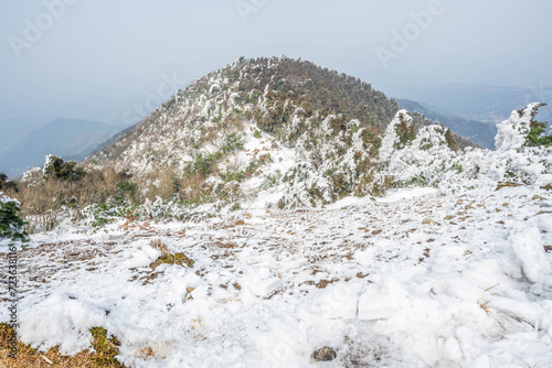 Rime and snow scene at Zigaifeng, Hengshan Mountain, Nanyue, China photo