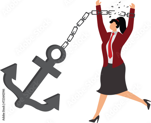 Businesswoman struggling to break free from shackles,