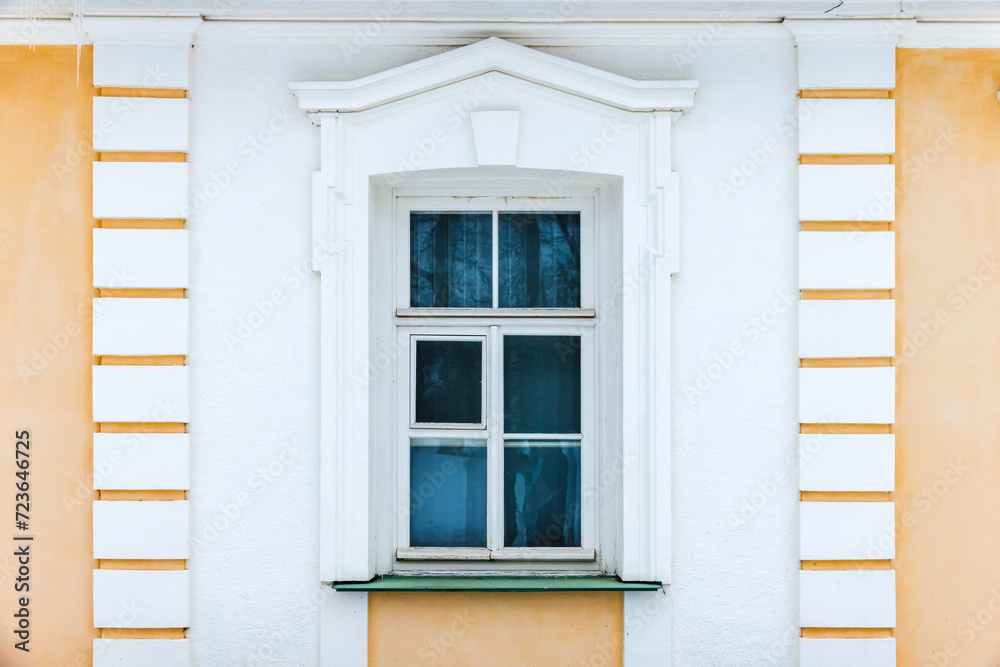 Fototapeta premium Classic architecture details, background photo texture. Window