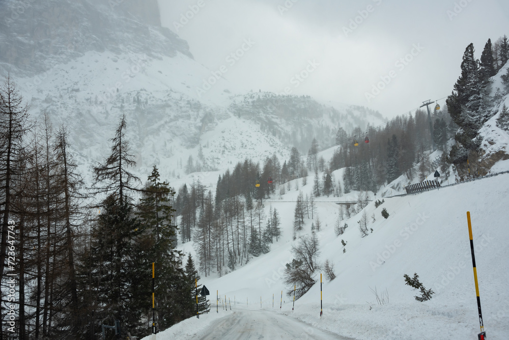 Fototapeta premium Bad winter weather in mountains, winter road