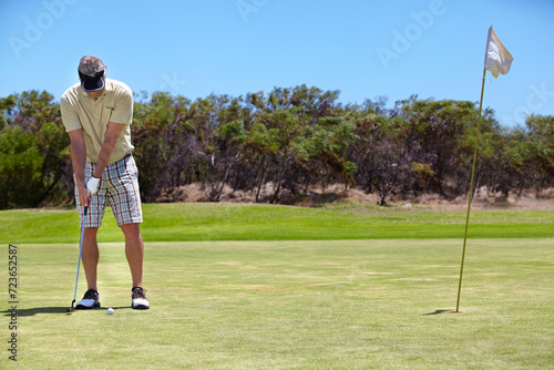 Sport, man and golfer on course outdoor for playing, performance or game with fitness or wellness. Athlete, mature person or golf with club, ball or exercise on grass for recreation, workout or hobby