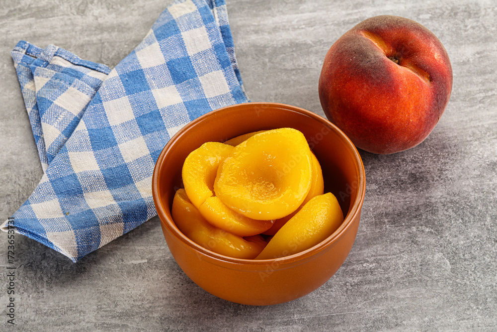 Ripe sweet and juicy canned peach Ripe sweet and juicy canned peach