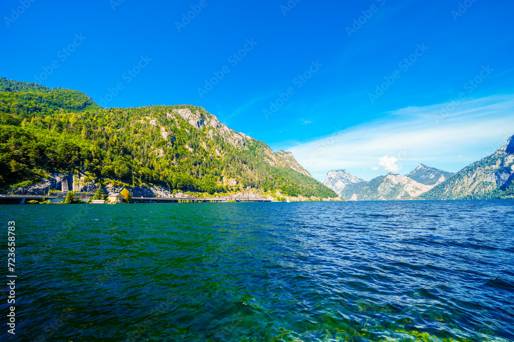 View of Traunsee and the surrounding landscape. Idyllic nature by the lake in Styria in Austria. Mountain lake at the Dead Mountains in the Salzkammergut.
