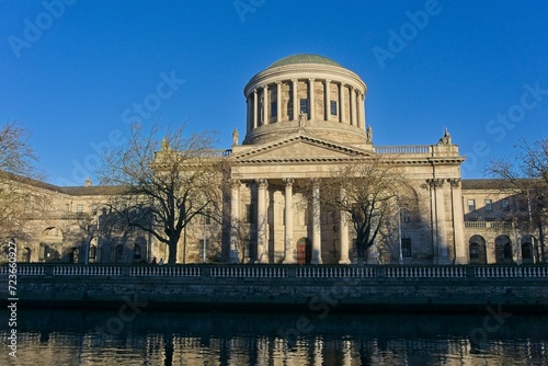 Four Courts seen across Liffey river in Inns Quay, Dublin, Ireland