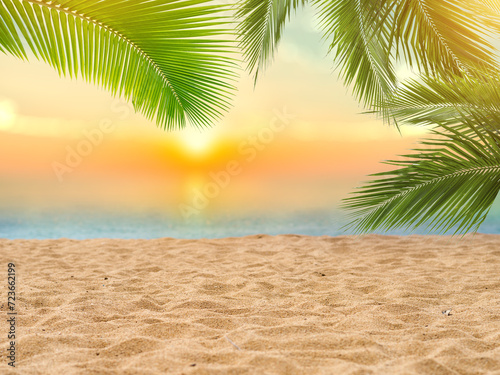 Fototapeta Naklejka Na Ścianę i Meble -  Blur beautiful nature green palm leaf on tropical beach with bokeh sun light wave abstract background. Copy space of summer vacation and business travel concept. Vintage tone filter effect color style