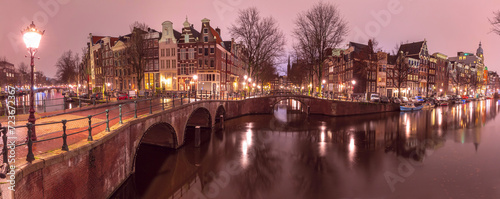 Panorama of Amsterdam canal Keizersgracht with typical dutch houses at night, Holland, Netherlands