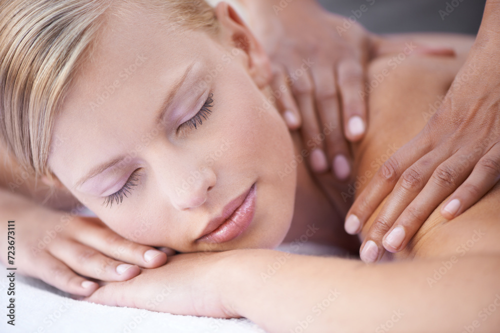 Young woman, hands and massage for back in spa, health and wellness on bed for physical therapy. Person, reflexology and masseuse for body treatment by touch and muscle comfort with peace at resort Young woman, hands and massage for back in spa, health and wellness on bed for physical therapy. Person, reflexology and masseuse for body treatment by touch and muscle comfort with peace at resort