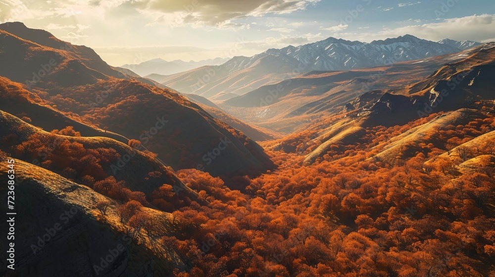 Golden Autumn Landscape with Rolling Hills and Majestic Mountains Bathed in Sunlight