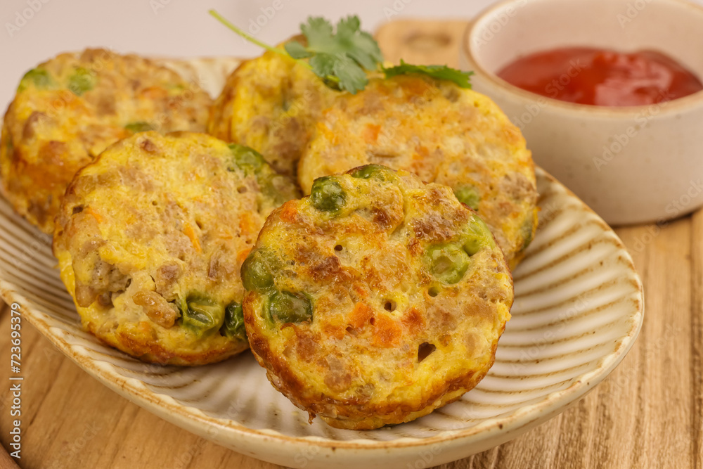 Tortang Giniling is a Filipino Ground Beef Omelette, Like a Fritter, Filled with Ground Beef and Veggies. Tortang Giniling is a Filipino Ground Beef Omelette, Like a Fritter, Filled with Ground Beef and Veggies.