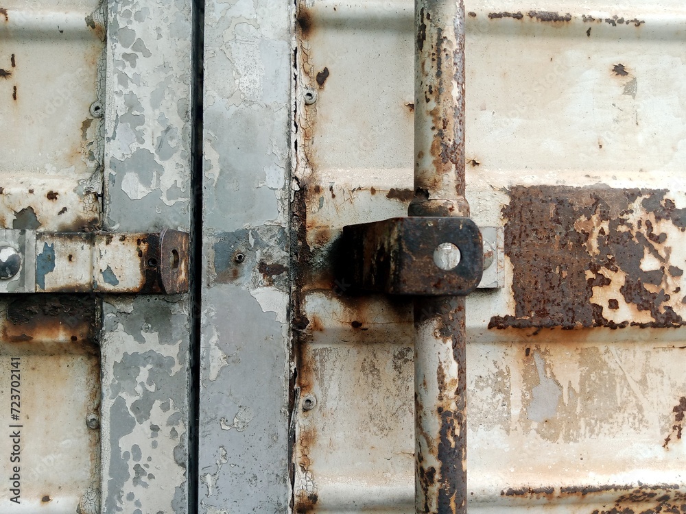 Rusty white metal door. rusty iron texture. Suitable for rusty background themes Rusty white metal door. rusty iron texture. Suitable for rusty background themes
