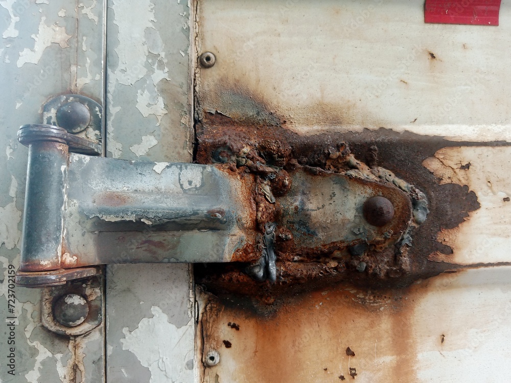 Rusty white metal door. rusty iron texture. Suitable for rusty background themes Rusty white metal door. rusty iron texture. Suitable for rusty background themes