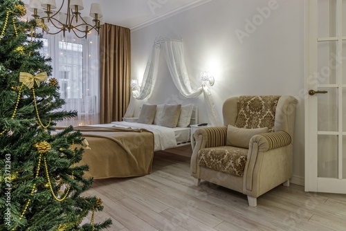 Nordic, cozy living room interior with a Christmas tree, wite tones, coffee table, and sofa