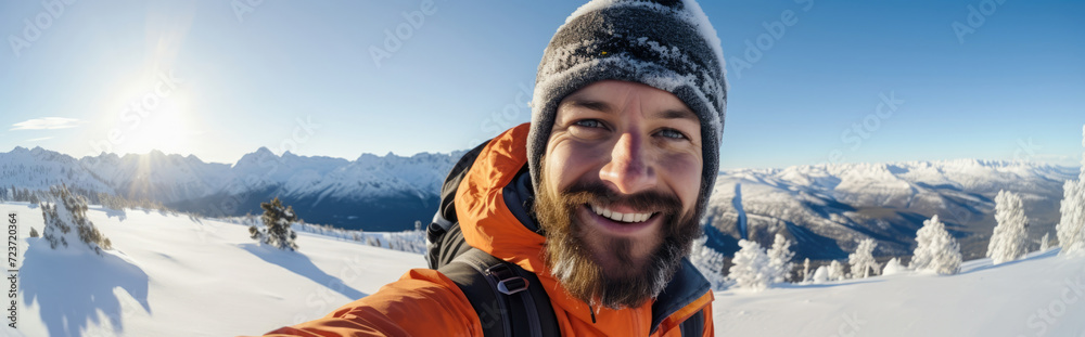 Man adult young adventure happy nature person traveler outdoors male lifestyle portrait winter snow Man adult young adventure happy nature person traveler outdoors male lifestyle portrait winter snow