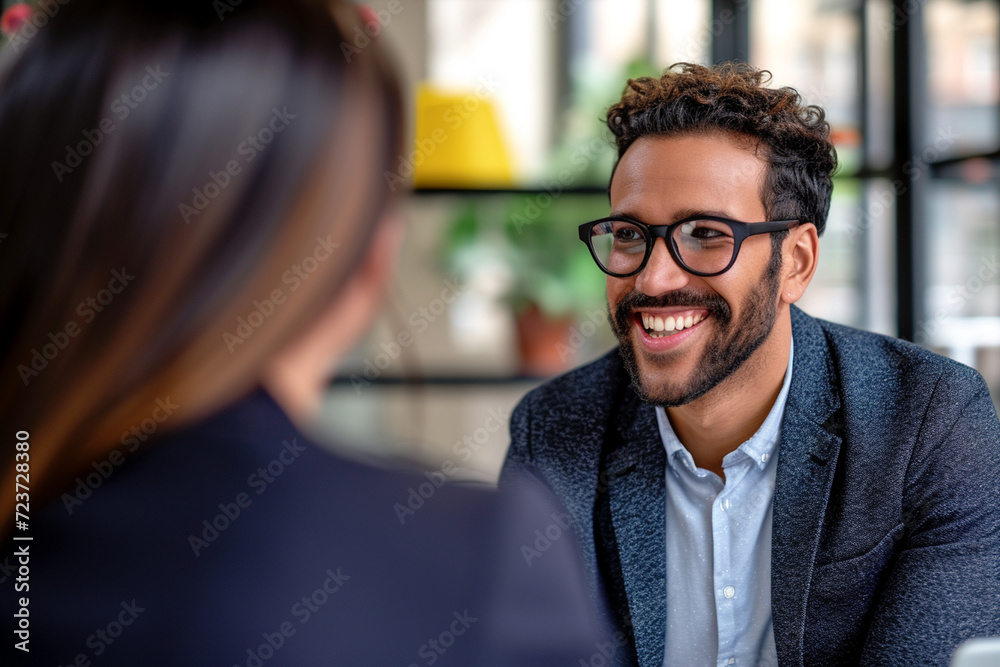 Happy businesswoman interviewing a well-prepared job candidate in a cozy office environment. The job interview process - from expectation to excitement, captured in high-definition Happy businesswoman interviewing a well-prepared job candidate in a cozy office environment. The job interview process - from expectation to excitement, captured in high-definition