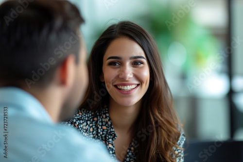 Happy businesswoman interviewing a well-prepared job candidate in a cozy office environment. The job interview process - from expectation to excitement, captured in high-definition