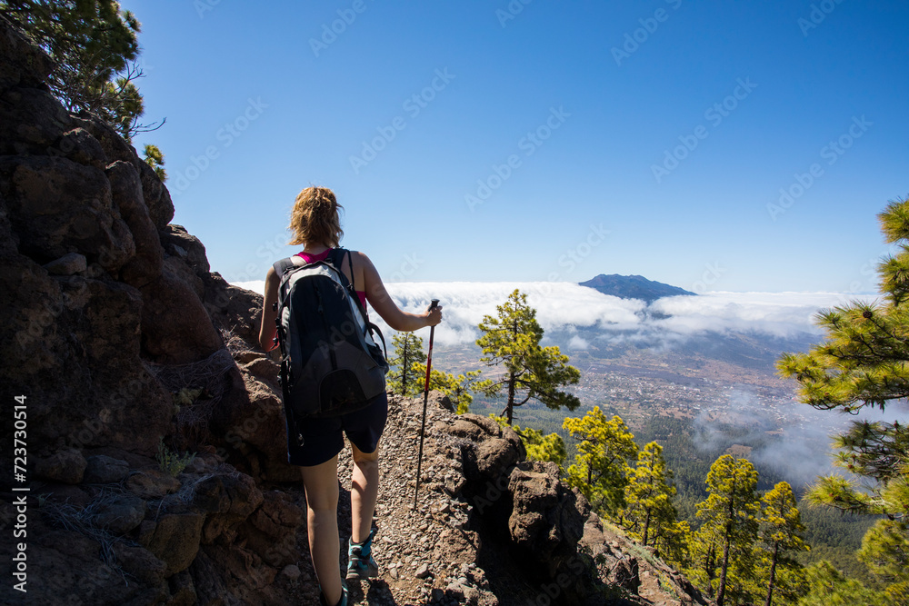 Obraz premium Young woman summit to Bejenado Peak in Caldera de Taburiente, La Palma, Spain