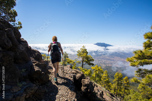 Young woman summit to Bejenado Peak in Caldera de Taburiente, La Palma, Spain photo