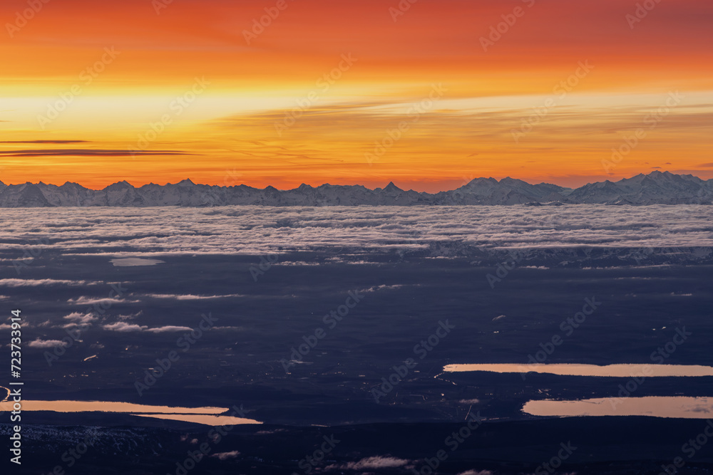 Fototapeta premium Colourful morning sky with Cirrus clouds above Swiss Alps