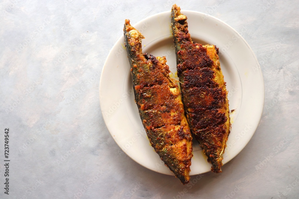 Indian Mackerel fish fry. Bangda Rava fry. whole Fried fish served on a