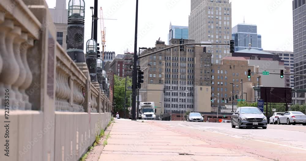 Kansas City, Missouri, USA - June 15, 2023: Afternoon light shines on historic buildings in downtown Kansas City. Kansas City, Missouri, USA - June 15, 2023: Afternoon light shines on historic buildings in downtown Kansas City.