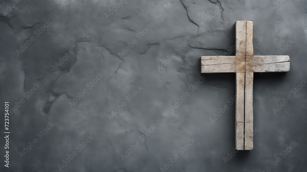 Wooden cross on concrete background. Wooden cross on dark background