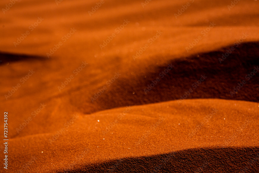 Wadi Rum Desert in Jordan. On the Sunset. Panorama of beautiful sand pattern on the dune. Desert landscape in Jordan. Travel concept. Freedom Wadi Rum Desert in Jordan. On the Sunset. Panorama of beautiful sand pattern on the dune. Desert landscape in Jordan. Travel concept. Freedom