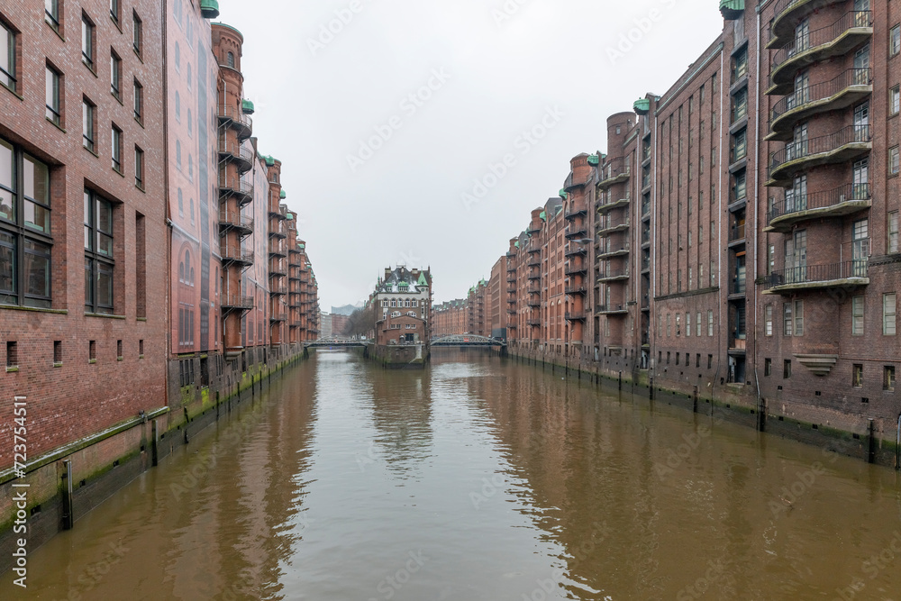 Germany's second largest city Hamburg streets canals and symbolic buildings snow and colorful cloudy sky and daylight in winter