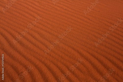 Wadi Rum Desert in Jordan. On the Sunset. Panorama of beautiful sand pattern on the dune. Desert landscape in Jordan. Travel concept. Freedom © romeof