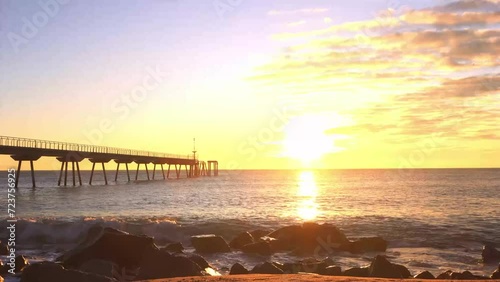 Puente del Petroli, Badalona, ​​España. TimeLapse capturado durante el amanecer de Enero. photo