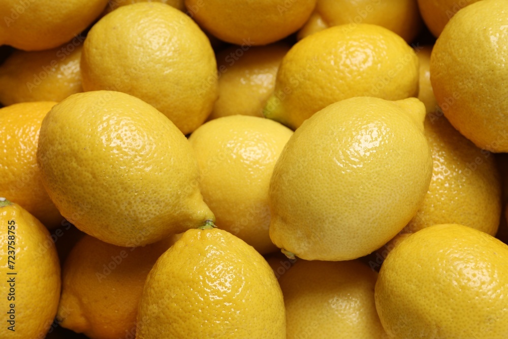 Fresh lemons as background, closeup. Citrus fruit Fresh lemons as background, closeup. Citrus fruit